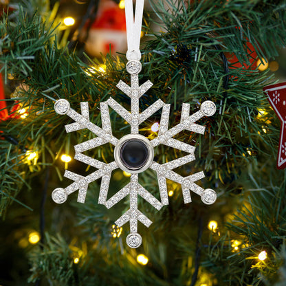 Copper personalised projection ornament hanging on a Christmas tree — photo snowflake keepsake, custom photo gift