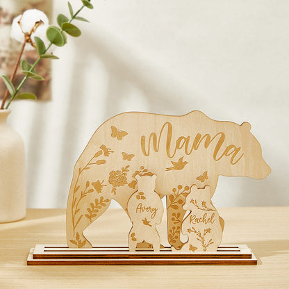 Styled on a home desk: personalised mama bear with cubs ornament beside a laptop — thoughtful gift for Mum or home office decor