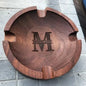 Walnut engraved cigar rest styled in a study with cigar and glass – elegant Father's Day gift and man‑cave accessory