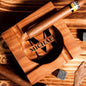 Personalised walnut cigar ashtray side view showing single-cut carved base and deep-set cigar grooves, engraved wooden cigar rest