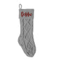 Personalised knitted stocking displayed on a fireplace – 18in custom name Christmas decoration to start a family tradition
