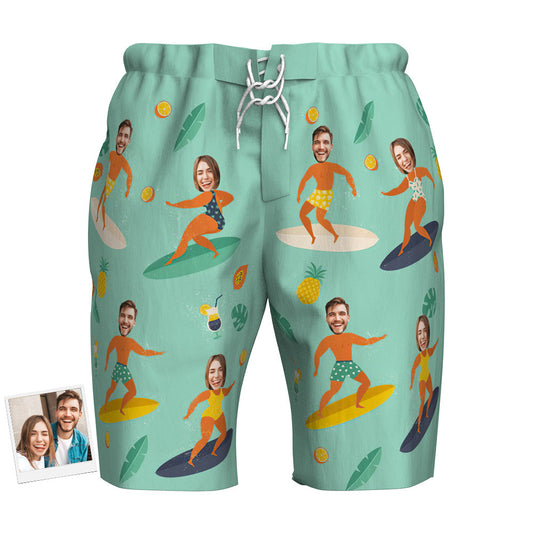 Lifestyle view of personalised couple beach shorts showing printed faces, breathable polyester and double-stitched seams — a playful Valentine's Day or anniversary surfwear gift