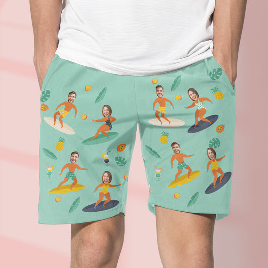 Lifestyle view of personalised couple beach shorts showing printed faces, breathable polyester and double-stitched seams — a playful Valentine's Day or anniversary surfwear gift