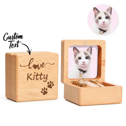 Compact walnut keepsake box shown in hand to illustrate scale (6cm × 6cm × 4cm) – ideal for tiny mementos and a lock of fur