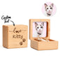 Compact walnut keepsake box shown in hand to illustrate scale (6cm × 6cm × 4cm) – ideal for tiny mementos and a lock of fur