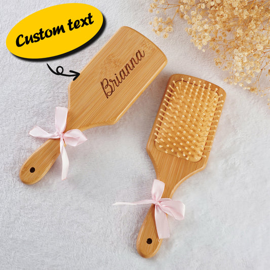 Personalised bamboo hairbrush with custom engraved name on paddle – sustainable bridesmaid gift and travel-friendly detangling brush