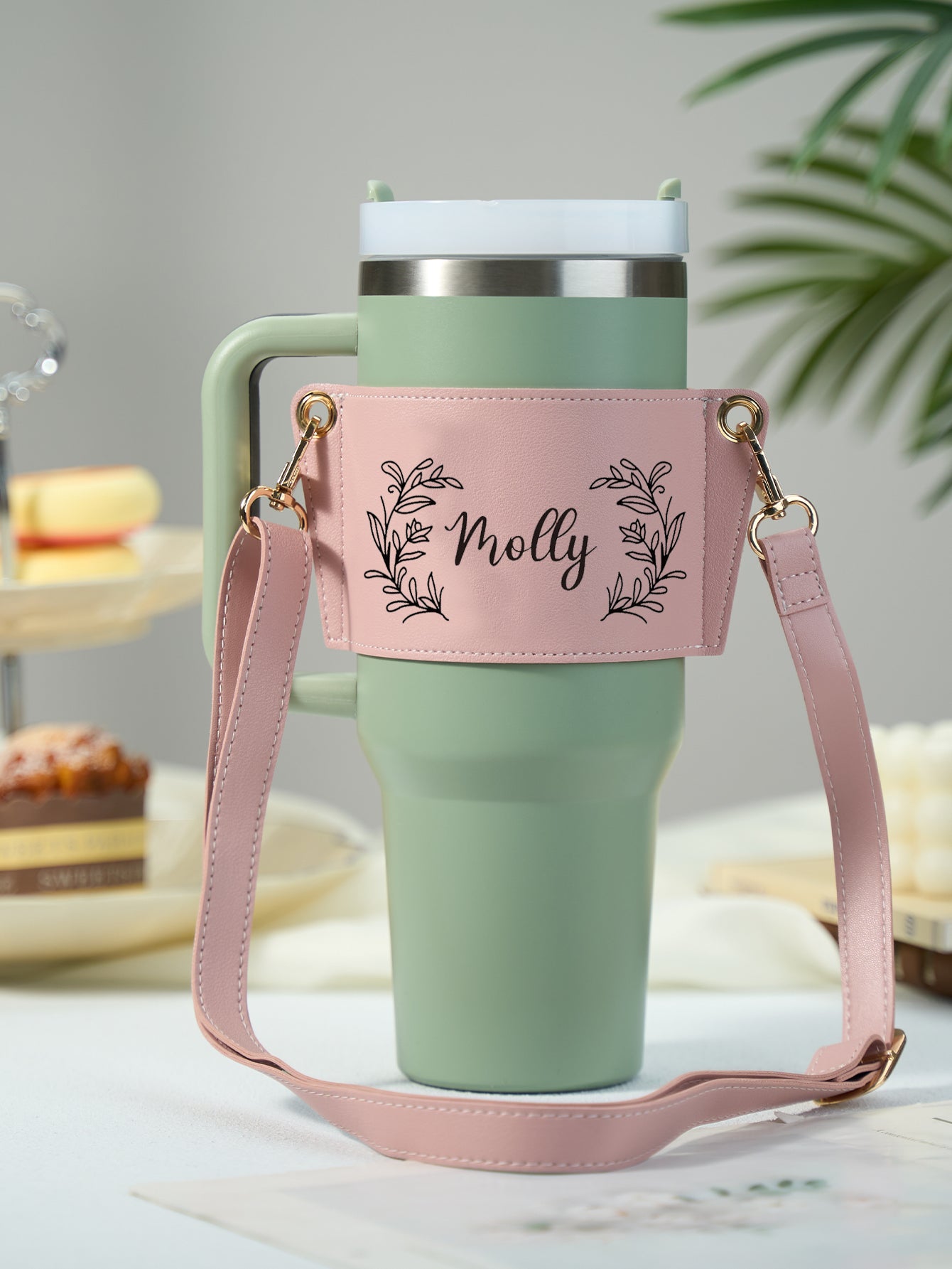 Adjustable PU leather strap detail on personalised floral 40oz tumbler carrier — length 64.7–118 cm for shoulder or crossbody wear