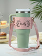 Adjustable PU leather strap detail on personalised floral 40oz tumbler carrier — length 64.7–118 cm for shoulder or crossbody wear