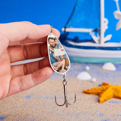 Side view of personalised engraved fishing lure showing high-detail photo engraving, custom name option and sharp treble hook with plastic cover