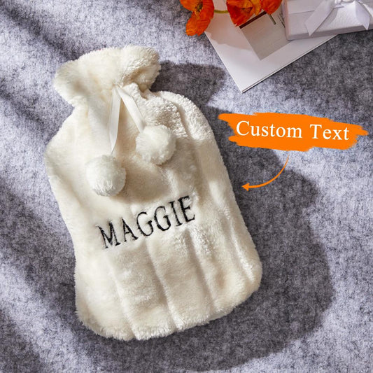 Removable short-plush cover partially removed to reveal durable no-leak rubber hot water bottle and secure stopper, 22.5 x 34 cm