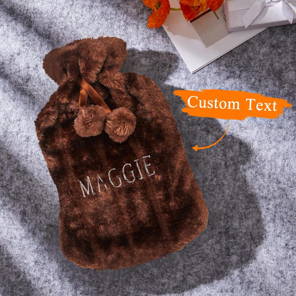 Personalised hot water bottle shown upright to display compact 22.5 x 34 cm shape and sturdy construction, ideal embroidered gift