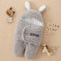 Demonstration of personalised name option on the swaddle.