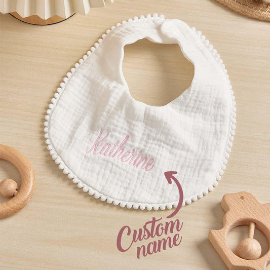 Personalised baby bib with embroidered name on soft absorbent cotton — perfect newborn gift and keepsake