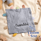 Embroidered name detail on personalised cotton lovey – machine-washable baby comfort towel, 23 x 23 cm