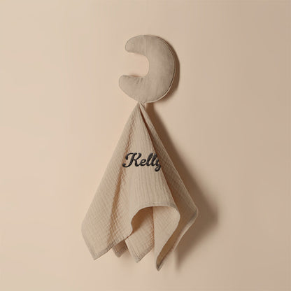 Macro shot of embroidery thread on personalised baby towel showing quality stitching on soft cotton comfort blanket