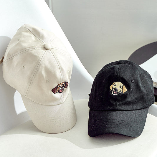 Personalised embroidered pet hat in beige showing a detailed custom dog portrait on the front panel, custom pet photo cap