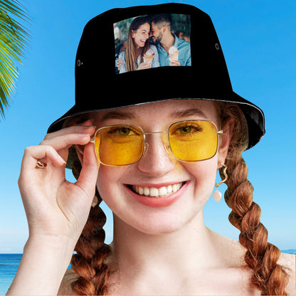 Angled shot of personalised photo bucket hat showing full brim print and cotton-like polyester texture — custom fisherman sun hat for beach and travel