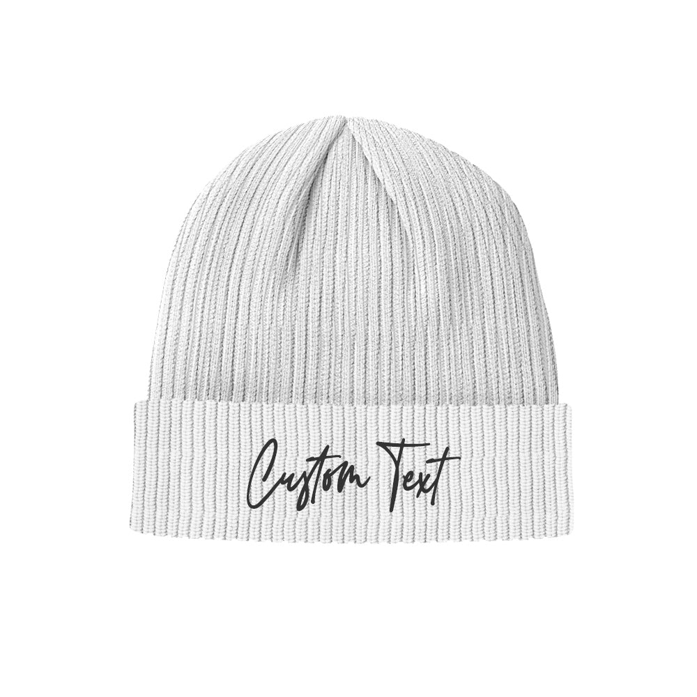 Lifestyle shot of a unisex personalised winter beanie styled for outdoor sports — knitted adult cap offering thermal warmth and snug ear coverage for skiing or skating