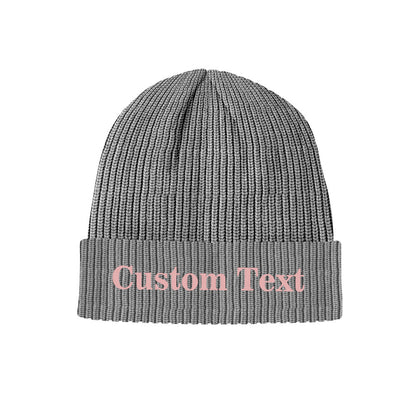 Detailed knit texture close-up of a personalised beanie cuff showing elastic acrylic fibres — custom text knitted winter cap, comfortable and thermal