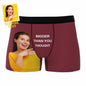Folded personalised boxer shorts showing all‑over custom photo and text design on breathable, lightweight fabric — ideal personalised photo gift