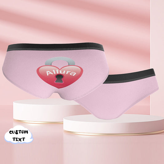 Close-up of personalised face briefs highlighting crisp custom text engraving, soft elastic waistband and stretch fleece material