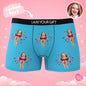 Customer example of personalised face placement on black boxers with red bow — playful personalised gift idea