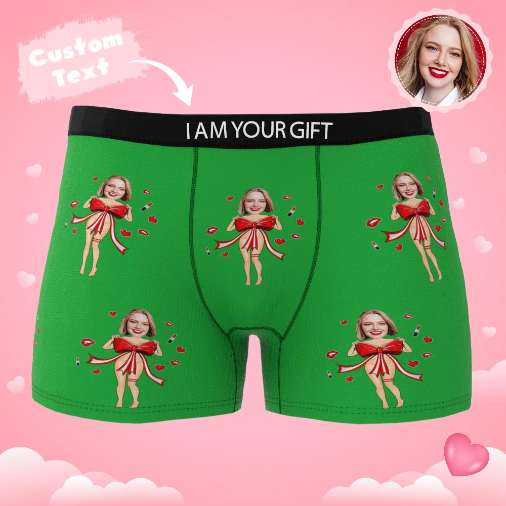 Lifestyle image of partner wearing personalised photo boxers with red bow — humorous Valentine's present for him