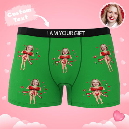 Lifestyle image of partner wearing personalised photo boxers with red bow — humorous Valentine's present for him