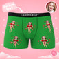 Lifestyle image of partner wearing personalised photo boxers with red bow — humorous Valentine's present for him