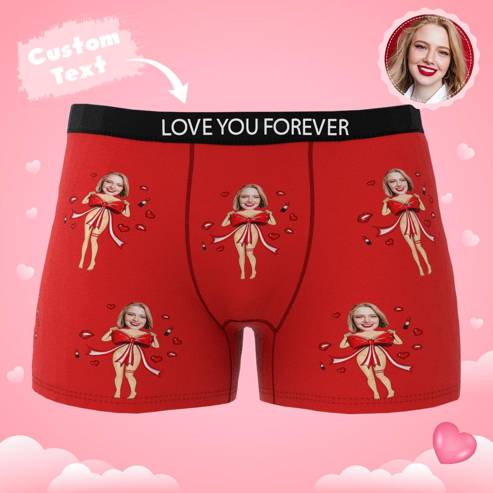 Gifting scene showing personalised photo boxers with red bow being presented — custom gift for husband or boyfriend