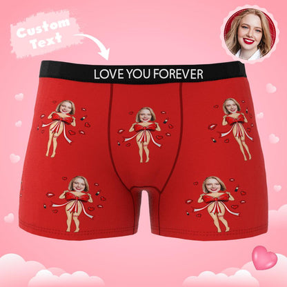 Gifting scene showing personalised photo boxers with red bow being presented — custom gift for husband or boyfriend