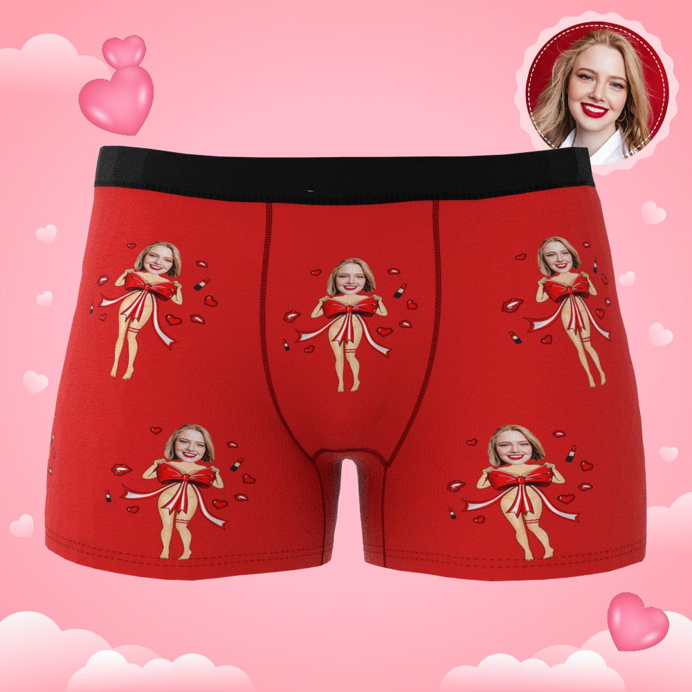 Customer example of personalised face placement on black boxers with red bow — playful personalised gift idea