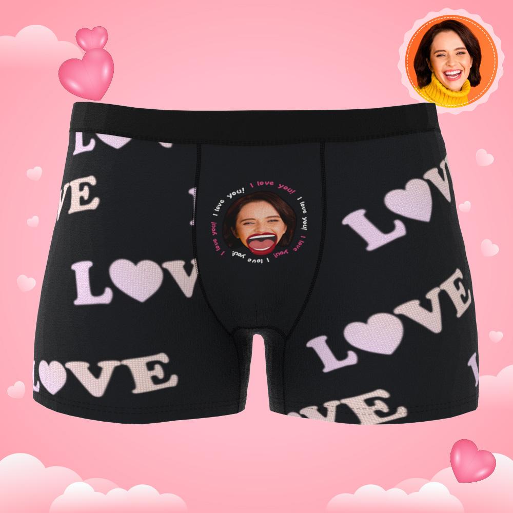 Flat-lay of personalised boxer shorts with cropped face design and vivid colours – bespoke photo gift for boyfriend