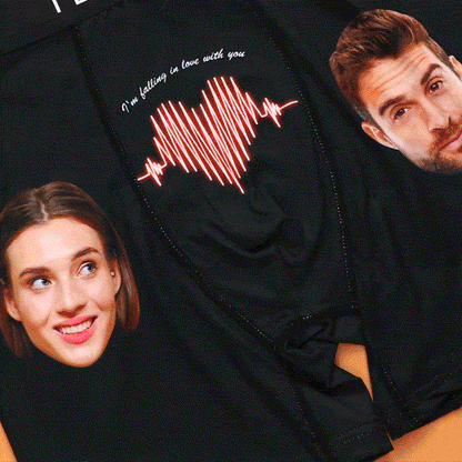 Close-up GIF of black personalised boxer shorts showing the ECG face print and vibrant colours — personalised photo gift with AR view.