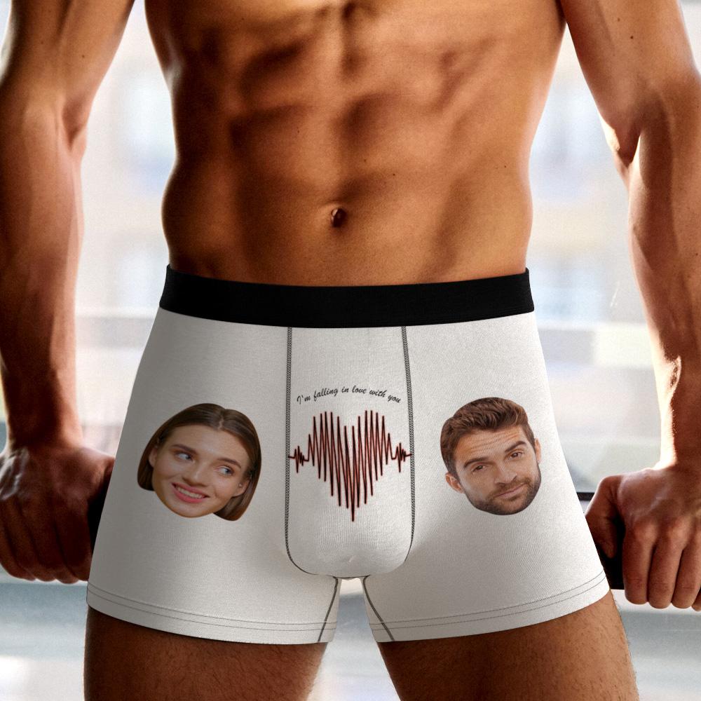 Flat-lay of black personalised photo boxer shorts with ECG face design, soft polyester fleece finish and comfortable elastic waistband — photo boxer shorts.