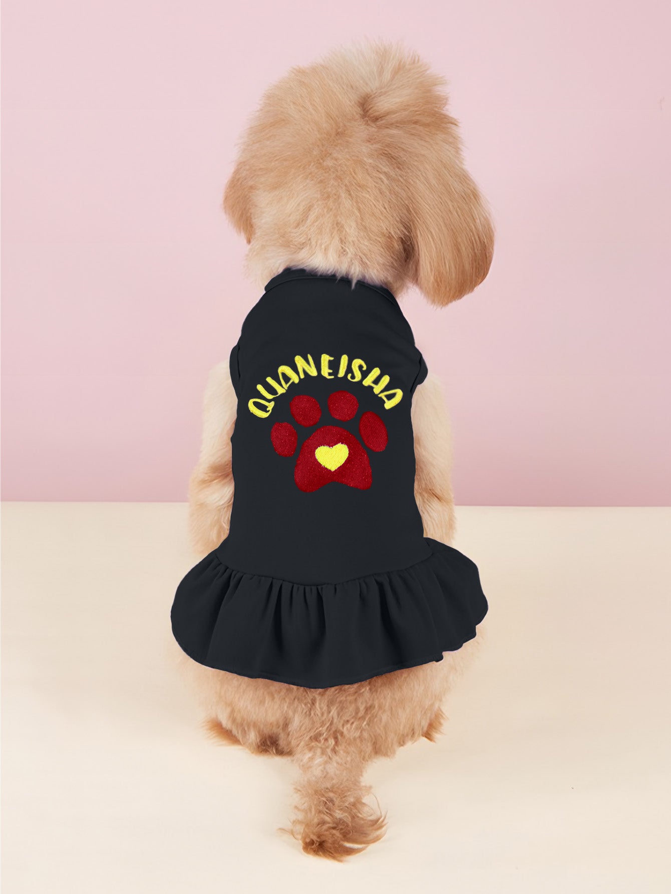 Back view of personalised embroidered pet dress showing neat finish and fastening for easy dressing, cotton material