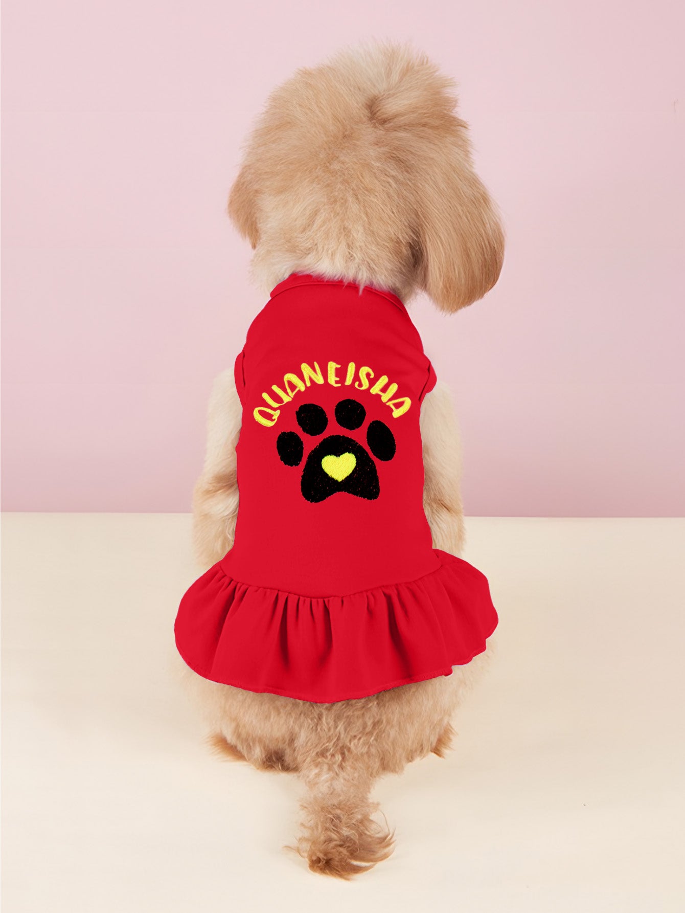 Fabric texture close-up of personalised dog & cat dress — soft cotton weave and quality embroidery detail
