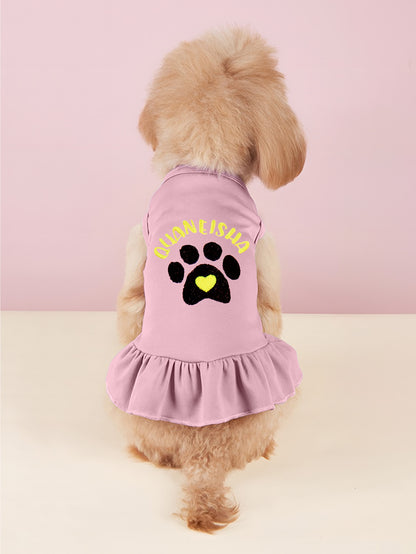 Packaging and dispatch image for personalised embroidered pet dress — quality inspection and ready for shipping