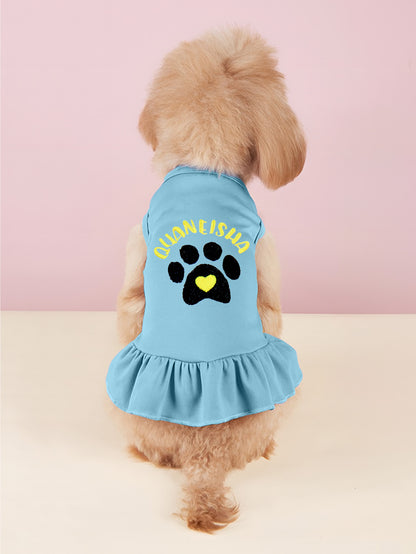 Comparison of different sizes for the personalised embroidered pet dress laid out to show fit and back length options