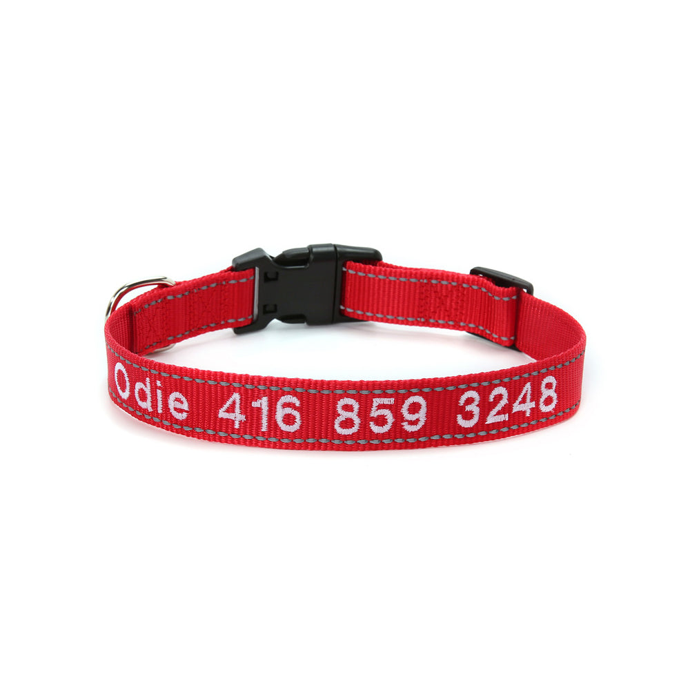 Reflective dog collar laid flat displaying size options and comfortable high‑density nylon construction for small to medium dogs