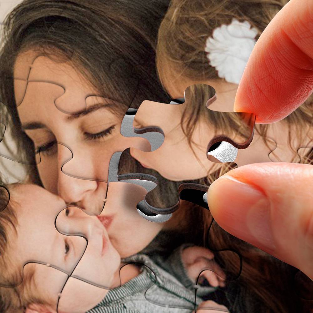 Close-up of interlocking puzzle pieces showing thick cardboard, tight connections and crisp UV-printed colours on a personalised photo puzzle