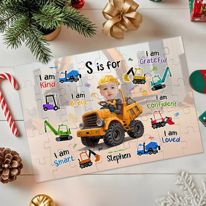 Personalised photo jigsaw puzzle featuring a bright construction truck and a child's portrait, ideal personalised kids' gift to encourage problem‑solving and fine motor skills