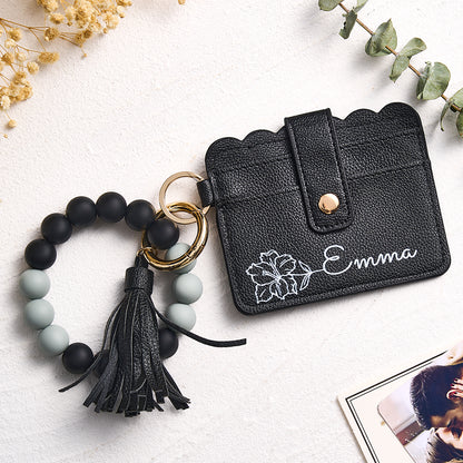 Styled gift presentation of personalised floral card wallet with beaded bracelet, ideal for birthdays, anniversaries or Mother's Day