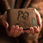 Overhead view of grey custom photo wallet showing personalised print and fine craftsmanship, great personalised gift for dad