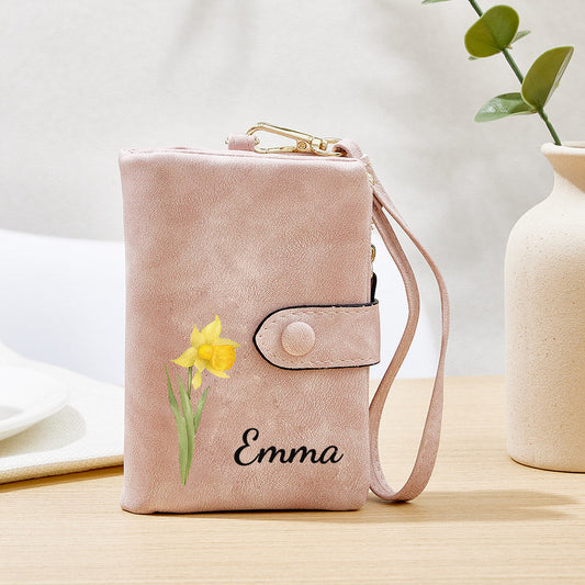 Front view of personalised name colourful birth flower PU leather card holder showing customised name and vivid floral print
