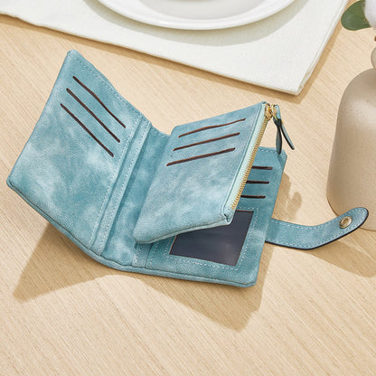 Slim personalised birth flower card holder open to reveal multiple card slots and printed name on premium PU leather