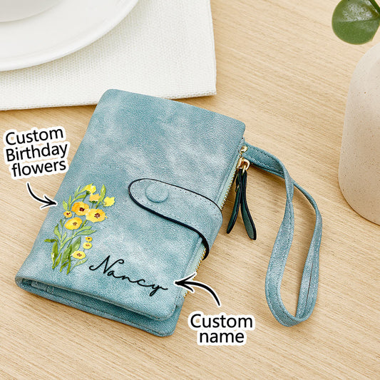 Front view of personalised name colourful birth flower PU leather card holder showing customised name and vivid floral print