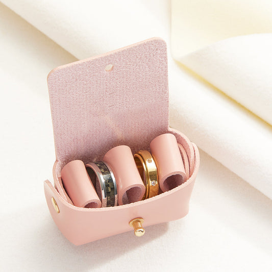 Open personalised leather ring pouch showing central divider for two rings — handcrafted double ring box for ring‑bearer and long‑term wedding keepsake