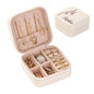 Personalised compact jewellery box displayed with wedding stationery – perfect for bridesmaids and brides