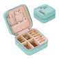 Interior view showing divided compartments for rings, bracelets and earrings in personalised jewellery box